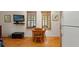 Practical kitchenette with an eat-in dining table and modern appliances at 1001 E Crawford St, Tampa, FL 33604