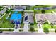 Aerial view of the property with a well-maintained lawn, bordered by a yellow line at 10626 Park Meadowbrooke Dr, Riverview, FL 33578