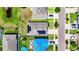 Overhead view of the house with solar panels, driveway, and bordered by a yellow outline at 10626 Park Meadowbrooke Dr, Riverview, FL 33578