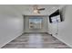 An empty bedroom with a ceiling fan and a window at 10626 Park Meadowbrooke Dr, Riverview, FL 33578
