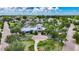 Aerial view showcasing the community center with lush landscaping and mature trees at 10626 Park Meadowbrooke Dr, Riverview, FL 33578