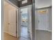Bright entryway featuring neutral tones and an open view to living area at 10626 Park Meadowbrooke Dr, Riverview, FL 33578