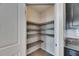 A corner pantry providing storage for the kitchen at 10626 Park Meadowbrooke Dr, Riverview, FL 33578
