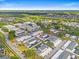 Aerial view of the community showcasing well-maintained landscaping, modern townhomes, and convenient parking at 11811 Cypress Crest Cir, Tampa, FL 33626