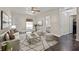 Cozy living room featuring neutral tones, stylish decor, and plenty of natural light at 11811 Cypress Crest Cir, Tampa, FL 33626