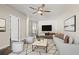Comfortable living room with plush seating, modern decor, and a welcoming atmosphere at 11811 Cypress Crest Cir, Tampa, FL 33626