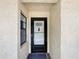 The image shows the front door of the unit at 14130 Rosemary Ln # 3215, Largo, FL 33774