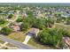 Beautiful two-story home with a spacious driveway surrounded by lush landscaping in a desirable neighborhood at 14282 Coronado Dr, Spring Hill, FL 34609