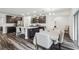 Open kitchen featuring an island with bar seating and stainless steel appliances at 14282 Coronado Dr, Spring Hill, FL 34609