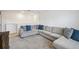 Cozy Gathering room, featuring an oversized L-shaped couch at 14282 Coronado Dr, Spring Hill, FL 34609