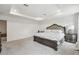 Main bedroom featuring a large bed and a tray ceiling with recessed lighting at 14282 Coronado Dr, Spring Hill, FL 34609