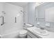 Cozy bathroom featuring a tub-shower combo, toilet, and vanity with sink and mirror at 1908 Canterbury Ln # 28, Sun City Center, FL 33573
