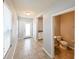 Bright foyer with tile flooring, leading to a powder room and other living spaces at 19200 Roseate Dr, Lutz, FL 33558