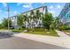 Well-maintained townhome with tropical landscaping and a fenced yard at 202 S Tampania Ave # 3, Tampa, FL 33609