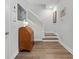 Hallway with beautiful laminate flooring and natural light at 202 S Tampania Ave # 3, Tampa, FL 33609