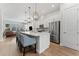Bright, modern kitchen with a large island, stainless steel appliances, and pendant lighting at 202 S Tampania Ave # 3, Tampa, FL 33609