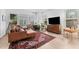 Bright living room featuring comfortable seating, large windows, and elegant decor at 202 S Tampania Ave # 3, Tampa, FL 33609