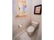 Modern toilet featuring unique wall art and decor at 202 S Tampania Ave # 3, Tampa, FL 33609