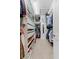 Walk-in closet offers ample storage with shelving and hanging space for clothes and accessories at 202 S Tampania Ave # 3, Tampa, FL 33609