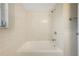 Bathroom with a tub shower with tile surround at 204 Cove Ct, Clearwater, FL 33756