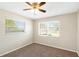 Bedroom with carpet flooring, a ceiling fan and natural light at 204 Cove Ct, Clearwater, FL 33756