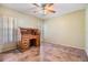 Bedroom featuring a large wooden desk, wood-look floors, and lots of natural light at 2308 Rio Cir, Spring Hill, FL 34608
