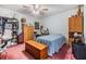 Bedroom with pink carpet, dresser, and lots of storage at 2308 Rio Cir, Spring Hill, FL 34608