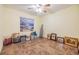 Bedroom featuring a large painting, tile floors, and lots of floor space at 2308 Rio Cir, Spring Hill, FL 34608