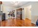Bright dining area with hardwood floors and traditional furnishings at 2308 Rio Cir, Spring Hill, FL 34608