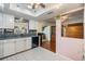 Modern kitchen with stainless steel appliances and white cabinets at 2308 Rio Cir, Spring Hill, FL 34608