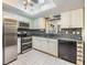 Updated kitchen with stainless steel appliances and ample counter space at 2308 Rio Cir, Spring Hill, FL 34608