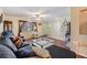 Cozy living room featuring hardwood floors, bright window and comfortable seating at 2308 Rio Cir, Spring Hill, FL 34608