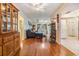 Open-concept layout with hardwood floors and views into adjoining living spaces at 2308 Rio Cir, Spring Hill, FL 34608