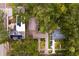 Aerial view of the homes showing the roofs and surrounding landscape at 2933 W Alline Ave, Tampa, FL 33611