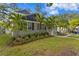 Charming front yard with manicured landscaping and inviting curb appeal at 2933 W Alline Ave, Tampa, FL 33611
