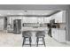 Spacious kitchen boasting stainless steel appliances, a stylish island, and plenty of counter space at 2933 W Alline Ave, Tampa, FL 33611