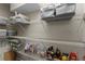 Well-organized pantry provides ample storage with shelves and baskets, maximizing space and accessibility at 2933 W Alline Ave, Tampa, FL 33611