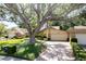 Charming home featuring well-maintained landscaping and a spacious driveway at 3071 Bolt Dr, Palm Harbor, FL 34685