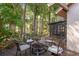 Cozy patio with a fire pit and comfortable seating, perfect for outdoor gatherings at 3071 Bolt Dr, Palm Harbor, FL 34685
