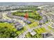 Spacious home from an aerial view, nestled in a peaceful neighborhood near a serene lake at 31643 Colada Drift Way, Wesley Chapel, FL 33545
