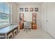 Bright office space with white tile floors and a large desk and chairs at 31643 Colada Drift Way, Wesley Chapel, FL 33545