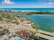 A stunning aerial view showcasing the home's desirable coastal location, near bay and beach at 321 N Boulevard Of The Presidents, Sarasota, FL 34236