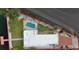 Aerial view of the property highlighting its waterfront location, private pool, and proximity to the beach at 321 N Boulevard Of The Presidents, Sarasota, FL 34236