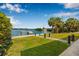 Beautiful backyard featuring a private dock and patio area at 321 N Boulevard Of The Presidents, Sarasota, FL 34236