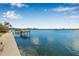 Scenic waterfront view from the property featuring a private dock, perfect for boating enthusiasts at 321 N Boulevard Of The Presidents, Sarasota, FL 34236