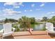 Deck view overlooking the canal, perfect for relaxing and enjoying the waterfront scenery at 3227 Rose Arbor Dr, Hernando Beach, FL 34607