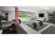 Spacious home gym with modern equipment, large mats, and plenty of natural light at 3227 Rose Arbor Dr, Hernando Beach, FL 34607