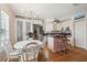 Eat in kitchen featuring granite countertops, updated appliances, and dining area at 3227 Rose Arbor Dr, Hernando Beach, FL 34607