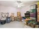 The storage room is well-organized with bins, boxes, shelves, and assorted household items at 3227 Rose Arbor Dr, Hernando Beach, FL 34607