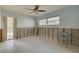 Bright bedroom featuring large window, access to the exterior, and ready for personalization and renovation at 328 Tallahassee Ne Dr, St Petersburg, FL 33702
